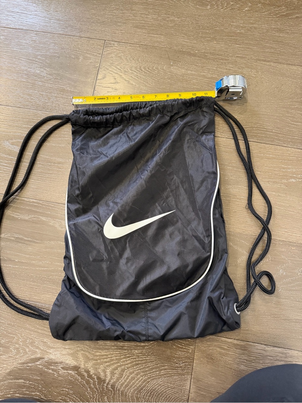 Nike Black Drawstring Backpack with White Swoosh